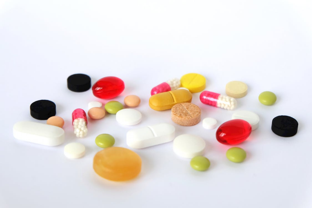 A picture shows a close-up of colorful pills and tablets.